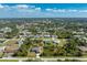 Aerial view of a single Gathering home, showcasing its location within a residential neighborhood at 7442 Clearwater St, Englewood, FL 34224