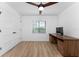 Spacious bedroom with wood floors and built-in desk at 7442 Clearwater St, Englewood, FL 34224