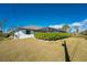 Single-story home with fenced backyard and lush landscaping at 7442 Clearwater St, Englewood, FL 34224