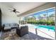 Outdoor patio with seating area and view of refreshing pool at 7442 Clearwater St, Englewood, FL 34224