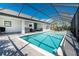 Large screened pool and patio with plenty of space for entertaining at 7442 Clearwater St, Englewood, FL 34224