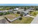 Aerial view showing house and backyard features at 7586 Sea Mist Dr, Port Charlotte, FL 33981