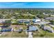 Aerial view of house and surrounding area at 7586 Sea Mist Dr, Port Charlotte, FL 33981