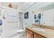 Bathroom with a shower/tub combo and granite countertop at 7586 Sea Mist Dr, Port Charlotte, FL 33981