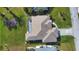 Aerial view of a single Gathering home with a large backyard at 8 Sportsman Rd, Rotonda West, FL 33947