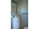 Small bathroom with a vanity and a wall-mounted mirror at 8194 Robert St, Englewood, FL 34224