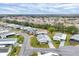 Aerial view showing a neighborhood of manufactured homes at 844 Seabrooke Ct, Englewood, FL 34223