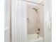 Clean bathroom with bathtub and shower at 8768 Conch Ave, Placida, FL 33946