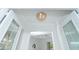 Elegant entryway with a unique light fixture at 8768 Conch Ave, Placida, FL 33946