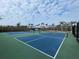 Two well-maintained pickleball courts provide recreational opportunities at 8768 Conch Ave, Placida, FL 33946