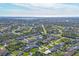 Wide aerial view of the region highlighting the proximity of this single Gathering home to the ocean at 9240 New Martinsville Ave, Englewood, FL 34224