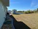 Spacious backyard with storage shed and canal view at 9458 Melody Circle, Port Charlotte, FL 33981