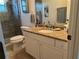 Bathroom with granite countertop and walk-in shower at 9458 Melody Circle, Port Charlotte, FL 33981