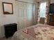 Bedroom with floral bedding and a large closet at 9458 Melody Circle, Port Charlotte, FL 33981