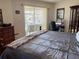 Main bedroom with king bed and sliding doors leading to the pool at 9458 Melody Circle, Port Charlotte, FL 33981