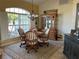 Cozy dining room with wooden table and hutch at 9458 Melody Circle, Port Charlotte, FL 33981