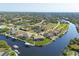 An aerial view of a waterfront community at 9676 Singer Cir, Port Charlotte, FL 33981