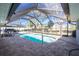 Enclosed pool area with a screened enclosure at 10 Sportsman Pl, Rotonda West, FL 33947