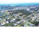 Expansive aerial view showcases the neighborhood's proximity to commercial areas and the coastline at 1005 E 2Nd St, Englewood, FL 34223