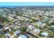 Aerial view of a suburban neighborhood featuring a mix of single-Gathering homes at 1005 E 2Nd St, Englewood, FL 34223