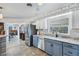 Open concept kitchen with stainless steel appliances and granite countertops with an eat-in space at 1005 E 2Nd St, Englewood, FL 34223