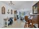 Inviting living room with vintage furniture, neutral paint, and lots of natural light at 1005 E 2Nd St, Englewood, FL 34223