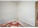 Empty room showcasing a window with light-colored tile flooring and a white wall at 1216 Whitney Dr, Venice, FL 34293