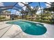 Screened-in pool with a wonderful pond view, and a backyard grill at 1216 Whitney Dr, Venice, FL 34293