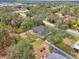 Aerial view of a house with a backyard and surrounding neighborhood at 1312 Wasilla St, North Port, FL 34291