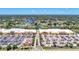 Aerial view of shopping center and surrounding neighborhood at 1312 Wasilla St, North Port, FL 34291