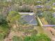 Aerial view showcasing the house and its expansive backyard at 1312 Wasilla St, North Port, FL 34291