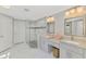 Elegant bathroom with double vanity and walk-in shower at 1312 Wasilla St, North Port, FL 34291