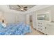 Main bedroom with large window and ceiling fan at 1312 Wasilla St, North Port, FL 34291