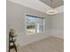 Bright dining room with large window and wainscoting at 1312 Wasilla St, North Port, FL 34291
