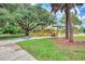 Accessible playground with shaded seating and play equipment at 1312 Wasilla St, North Port, FL 34291