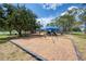 playground with swings and play structures at 1312 Wasilla St, North Port, FL 34291