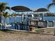 Private boat lift with covered docks, perfect for water access at 1449 Deer Creek Dr, Englewood, FL 34223