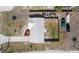 Aerial view of home showcasing roof, driveway and fenced backyard at 1455 New Point Comfort Rd, Englewood, FL 34223