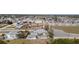 Aerial view of home in a coastal location near shops and local businesses offering a vibrant lifestyle at 1493 New Point Comfort Rd, Englewood, FL 34223
