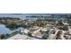 Aerial view of homes with waterfront access, showing the community's desirable location near the water at 1493 New Point Comfort Rd, Englewood, FL 34223