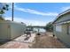 Backyard featuring the lake, a shed, and a patio at 1493 New Point Comfort Rd, Englewood, FL 34223