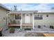 A welcoming front entrance with a cozy porch, perfect for enjoying peaceful mornings at 1493 New Point Comfort Rd, Englewood, FL 34223