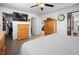 Spacious bedroom with a walk-in closet, ensuite bathroom and a large window for natural light at 1493 New Point Comfort Rd, Englewood, FL 34223