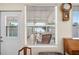 View from the house featuring a window with blinds, showing view of the lake at 1493 New Point Comfort Rd, Englewood, FL 34223