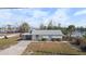 Charming single-story home with a covered parking area, and a water view at 1495 New Point Comfort Rd, Englewood, FL 34223