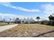 Charming single-story home featuring a carport and a spacious front yard, blending comfort with outdoor appeal at 1495 New Point Comfort Rd, Englewood, FL 34223