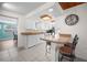 Updated kitchen with stainless steel appliances and a breakfast bar at 1495 New Point Comfort Rd, Englewood, FL 34223