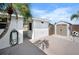 Backyard featuring shed, palm tree and view of neighborhood at 1495 New Point Comfort Rd, Englewood, FL 34223