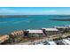 Building near waterfront with mature trees at 1501 Beach Rd # 209, Englewood, FL 34223