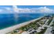 Beachfront property aerial view showcasing sandy beach and ocean at 1501 Beach Rd # 209, Englewood, FL 34223